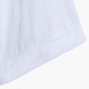 a close up of a white shirt on a white background